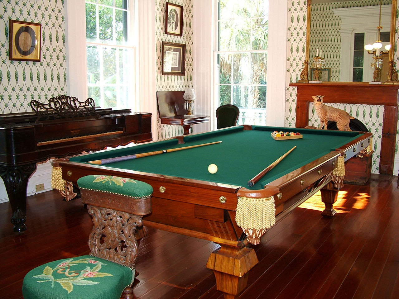 Billiard table and square grand piano in the Billiard Hall