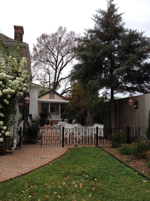 Courtyard gate with the guest cottage beyond
