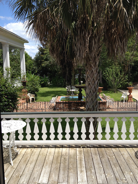 Fountain in the courtyard seen from the cottage deck