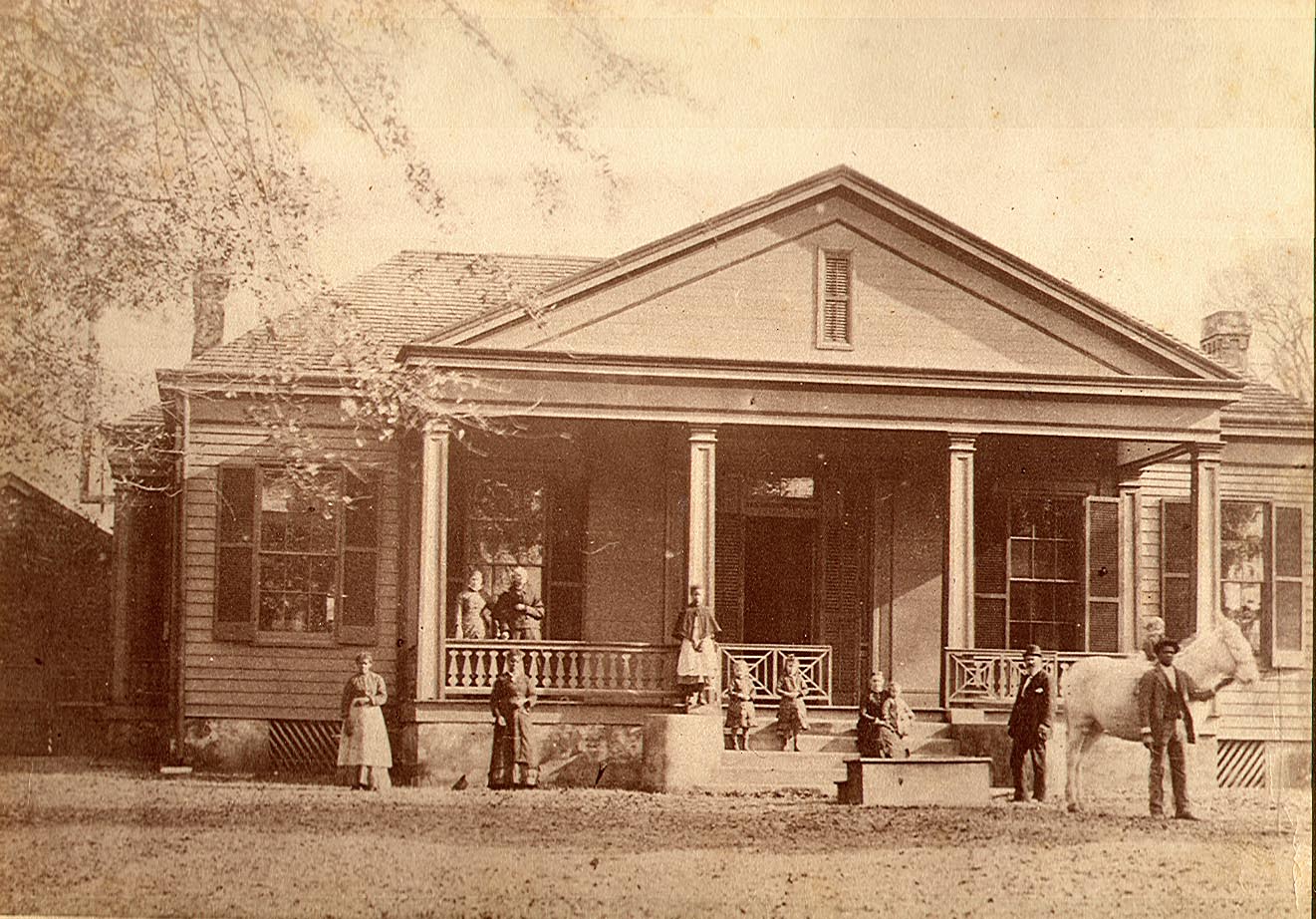 The Stone House in 1880 with the Stone family and a horse