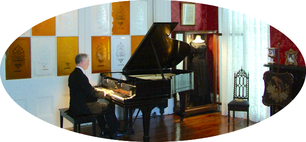 Musician at the grand piano in the Music Room